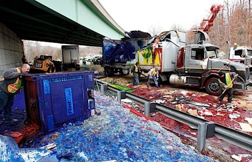 Overturned ink-carrying tractor-trailer paints the town red